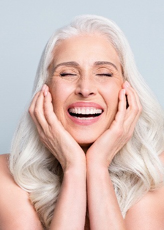 a dental implant patient smiling