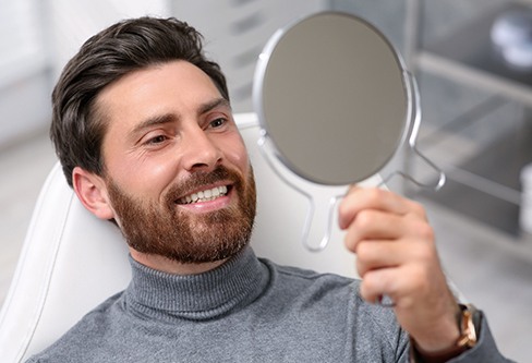 Man smiling in the dentist’s chair