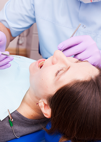 Woman undergoing a dental procedure