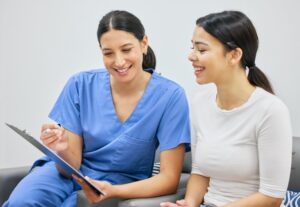 Patient and dentist consulting. 